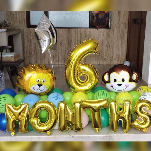 Jungle-themed 6-month birthday balloon bouquet