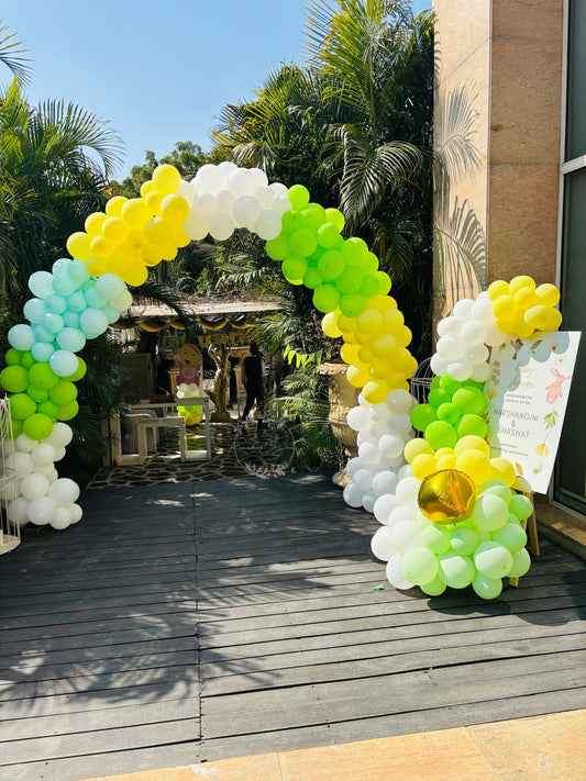 Baby Shower Backdrop with Balloons and Blooming Flower Bunches