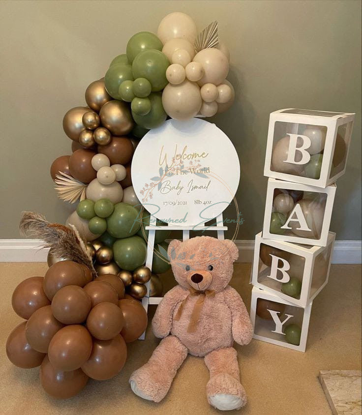 Charming welcome board with teddy bear accents and BABY boxes