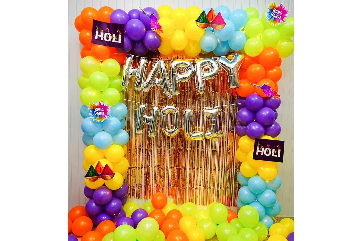 Celebrate the Festival of Colors: A Joyful Holi Backdrop with Vibrant Balloons