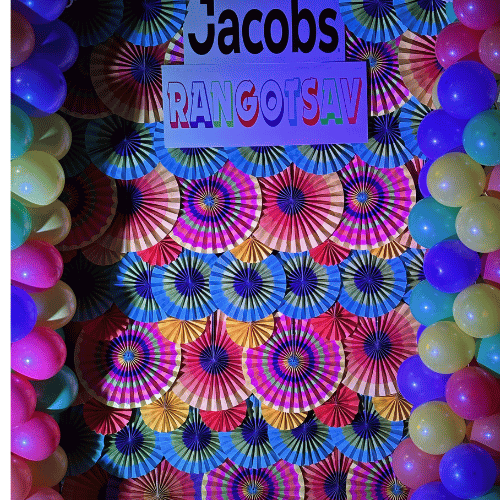 Festival of Colors: A Vibrant Holi Backdrop with Multicolor Fans, Bunting, and Holi Cutouts