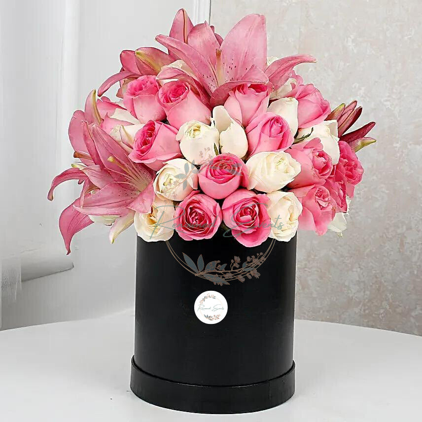 Lilies and Roses in a Round Box by Renowned Events