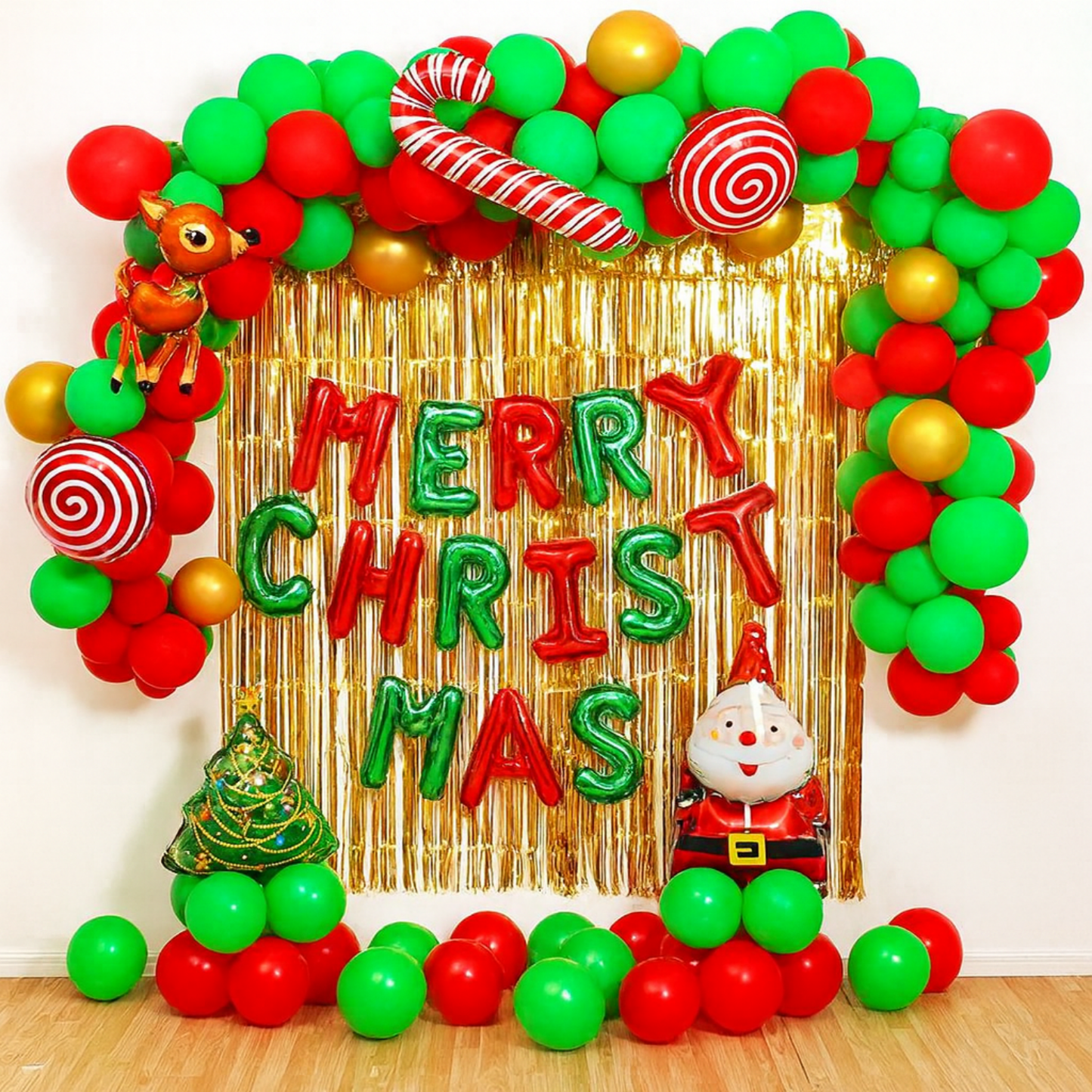 Celebrate Christmas with this vibrant red and green balloon decoration featuring Santa, reindeer, and a gold foil backdrop — perfect for parties and festive photos.