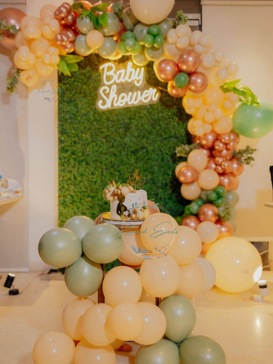 Whimsical Green Backdrop with Pastel Balloons – Celebrate Baby Shower in Style
