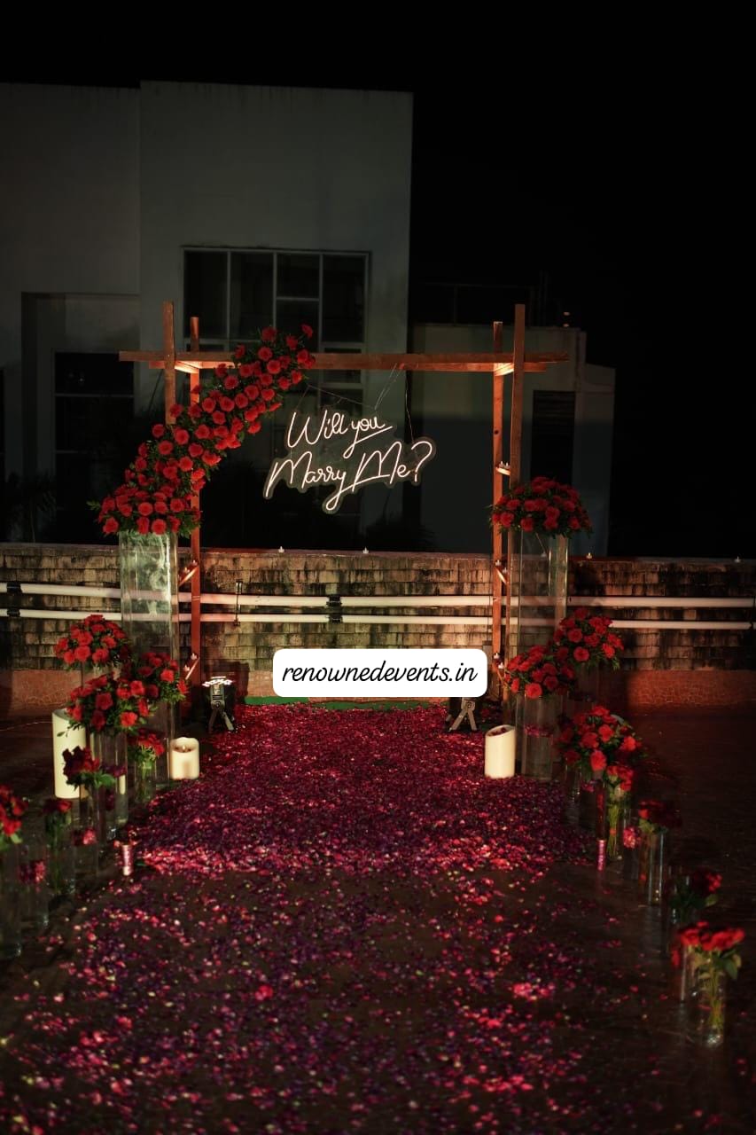 Romantic 'Marry Me' Proposal Amidst Roses and Candlelight Decoration