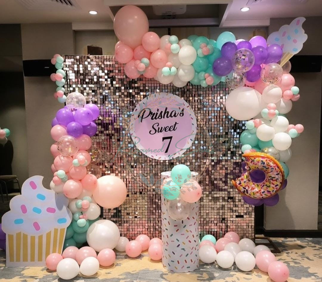 Sparkling Sweets: Shimmering Backdrop for a Candy-Themed Birthday Bash