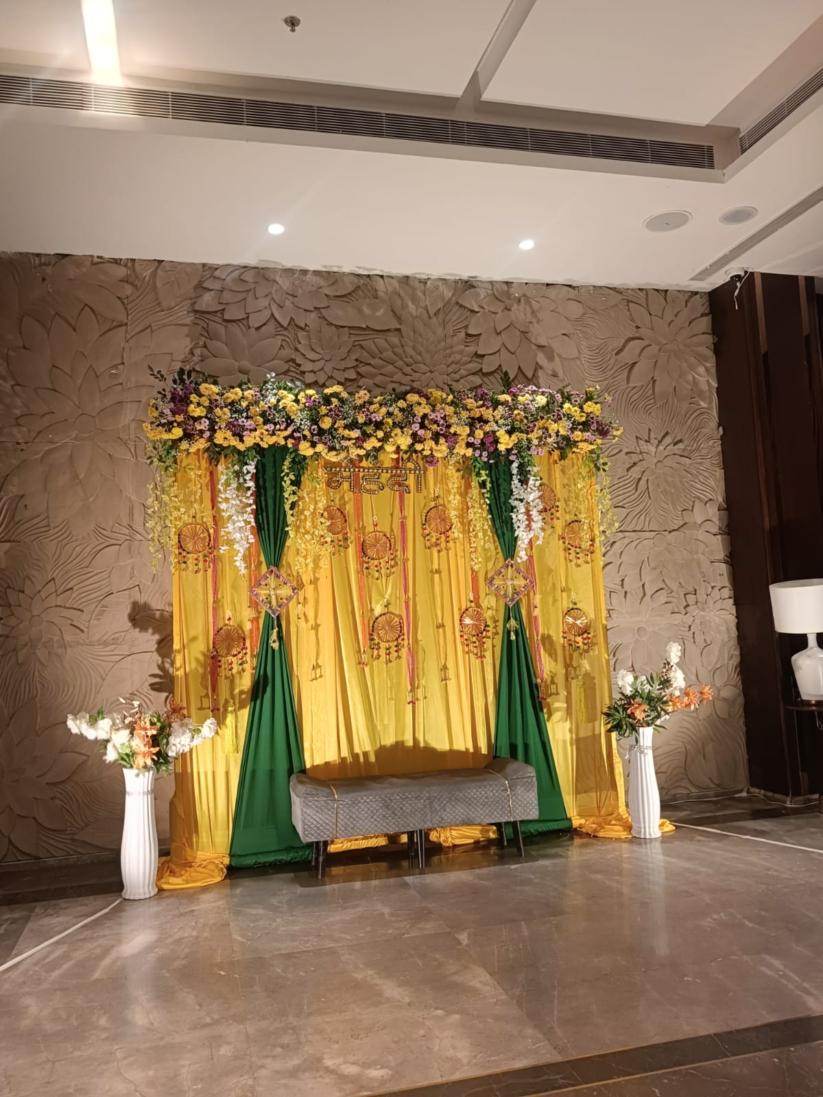 Haldi & Mehndi Ceremony Stage Decor | Yellow Green Floral Backdrop